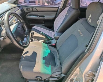 Сірий Міцубісі Lancer, об'ємом двигуна 1.6 л та пробігом 284 тис. км за 4330 $, фото 19 на Automoto.ua