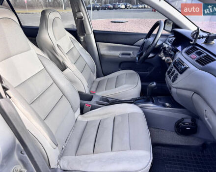 Сірий Міцубісі Lancer, об'ємом двигуна 1.3 л та пробігом 450 тис. км за 2850 $, фото 11 на Automoto.ua