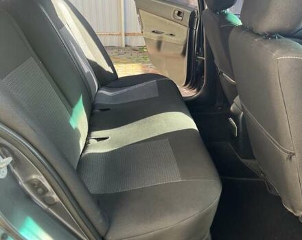 Сірий Міцубісі Lancer, об'ємом двигуна 1.58 л та пробігом 262 тис. км за 3900 $, фото 6 на Automoto.ua