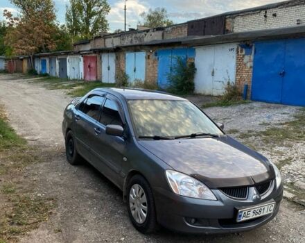 Сірий Міцубісі Lancer, об'ємом двигуна 1.6 л та пробігом 307 тис. км за 3700 $, фото 1 на Automoto.ua