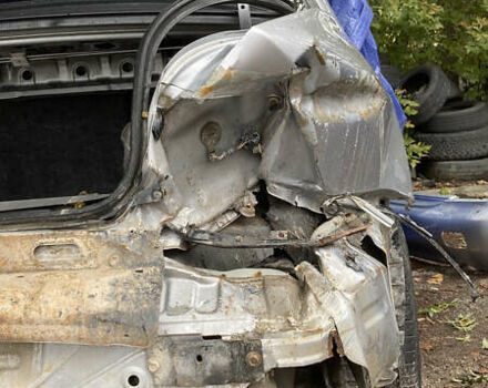 Сірий Міцубісі Lancer, об'ємом двигуна 1.58 л та пробігом 270 тис. км за 1999 $, фото 16 на Automoto.ua