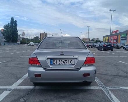 Сірий Міцубісі Lancer, об'ємом двигуна 1.6 л та пробігом 242 тис. км за 4300 $, фото 3 на Automoto.ua