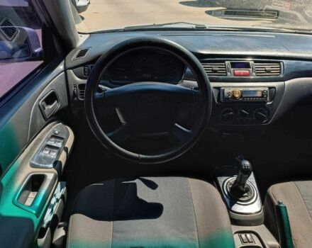 Сірий Міцубісі Lancer, об'ємом двигуна 1.6 л та пробігом 284 тис. км за 4330 $, фото 15 на Automoto.ua