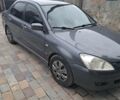 Сірий Міцубісі Lancer, об'ємом двигуна 1.58 л та пробігом 290 тис. км за 3900 $, фото 1 на Automoto.ua