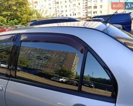 Серый Мицубиси Лансер, объемом двигателя 1.58 л и пробегом 385 тыс. км за 4500 $, фото 1 на Automoto.ua