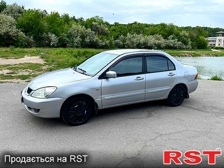 Серый Мицубиси Лансер, объемом двигателя 1.6 л и пробегом 260 тыс. км за 2900 $, фото 5 на Automoto.ua