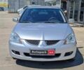 Сірий Міцубісі Lancer, об'ємом двигуна 1.6 л та пробігом 284 тис. км за 4330 $, фото 1 на Automoto.ua