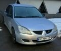 Сірий Міцубісі Lancer, об'ємом двигуна 1.58 л та пробігом 327 тис. км за 2600 $, фото 1 на Automoto.ua