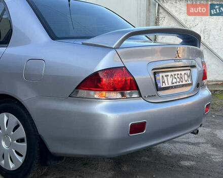 Серый Мицубиси Лансер, объемом двигателя 1.6 л и пробегом 320 тыс. км за 3650 $, фото 21 на Automoto.ua