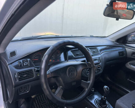 Серый Мицубиси Лансер, объемом двигателя 1.6 л и пробегом 320 тыс. км за 3650 $, фото 28 на Automoto.ua