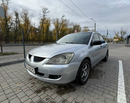 Серый Мицубиси Лансер, объемом двигателя 1.29 л и пробегом 263 тыс. км за 3400 $, фото 5 на Automoto.ua