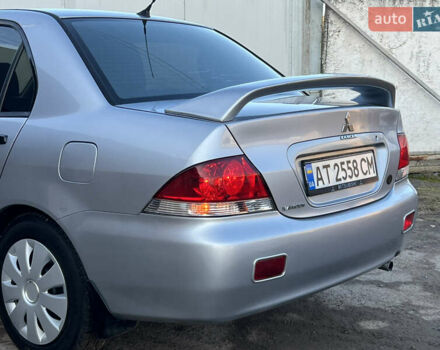 Серый Мицубиси Лансер, объемом двигателя 1.6 л и пробегом 320 тыс. км за 3650 $, фото 19 на Automoto.ua