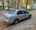 Серый Мицубиси Лансер, объемом двигателя 1.3 л и пробегом 230 тыс. км за 4000 $, фото 1 на Automoto.ua