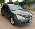 Сірий Міцубісі Lancer, об'ємом двигуна 1.6 л та пробігом 218 тис. км за 3650 $, фото 1 на Automoto.ua