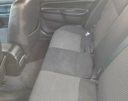Сірий Міцубісі Lancer, об'ємом двигуна 1.58 л та пробігом 360 тис. км за 4000 $, фото 16 на Automoto.ua