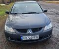 Мицубиси Лансер 2004 в Чернигове на Automoto.ua Серый Мицубиси Лансер, объемом двигателя 1.58 л и пробегом 320 тыс. км за 3900 $, фото 3 на Automoto.ua