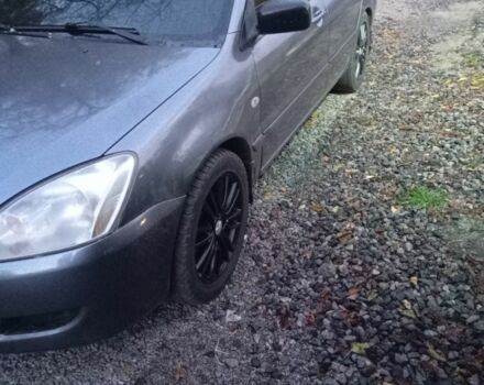 Мицубиси Лансер 2004 в Черкассах на Automoto.ua Серый Мицубиси Лансер, объемом двигателя 1.6 л и пробегом 313 тыс. км за 4800 $, фото 5 на Automoto.ua