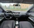 Серый Мицубиси Лансер, объемом двигателя 1.6 л и пробегом 259 тыс. км за 4600 $, фото 1 на Automoto.ua