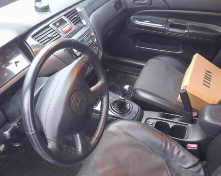 Серый Мицубиси Лансер, объемом двигателя 1.6 л и пробегом 290 тыс. км за 4000 $, фото 2 на Automoto.ua