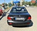 Серый Мицубиси Лансер, объемом двигателя 1.58 л и пробегом 167 тыс. км за 5100 $, фото 2 на Automoto.ua