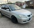Сірий Міцубісі Lancer, об'ємом двигуна 1.6 л та пробігом 485 тис. км за 1801 $, фото 1 на Automoto.ua