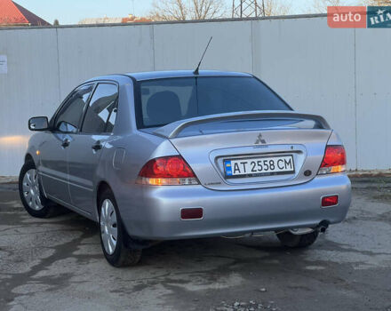 Серый Мицубиси Лансер, объемом двигателя 1.6 л и пробегом 320 тыс. км за 3650 $, фото 17 на Automoto.ua