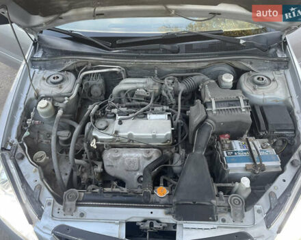 Сірий Міцубісі Lancer, об'ємом двигуна 1.58 л та пробігом 271 тис. км за 3000 $, фото 28 на Automoto.ua
