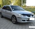 Сірий Міцубісі Lancer, об'ємом двигуна 1.6 л та пробігом 150 тис. км за 5600 $, фото 1 на Automoto.ua