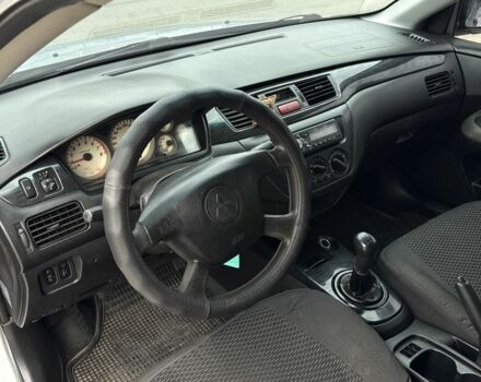 Серый Мицубиси Лансер, объемом двигателя 1.6 л и пробегом 360 тыс. км за 2400 $, фото 7 на Automoto.ua