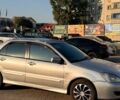 Серый Мицубиси Лансер, объемом двигателя 1.6 л и пробегом 275 тыс. км за 3500 $, фото 1 на Automoto.ua