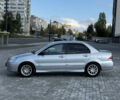 Сірий Міцубісі Lancer, об'ємом двигуна 1.6 л та пробігом 260 тис. км за 3899 $, фото 1 на Automoto.ua