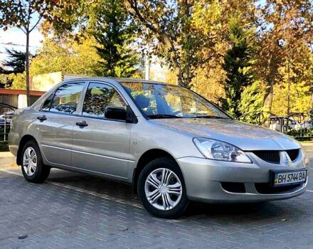 Сірий Міцубісі Lancer, об'ємом двигуна 1.3 л та пробігом 65 тис. км за 6550 $, фото 1 на Automoto.ua