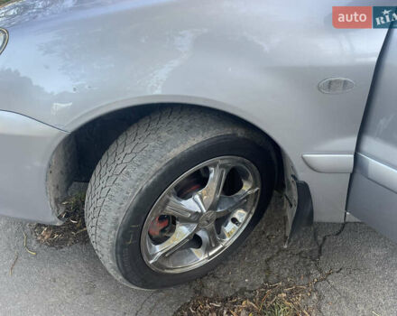 Сірий Міцубісі Lancer, об'ємом двигуна 1.58 л та пробігом 271 тис. км за 3000 $, фото 15 на Automoto.ua