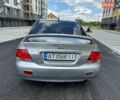 Серый Мицубиси Лансер, объемом двигателя 1.59 л и пробегом 200 тыс. км за 2599 $, фото 11 на Automoto.ua