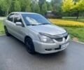 Сірий Міцубісі Lancer, об'ємом двигуна 1.3 л та пробігом 216 тис. км за 2999 $, фото 1 на Automoto.ua