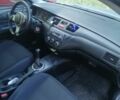 Сірий Міцубісі Lancer, об'ємом двигуна 2 л та пробігом 304 тис. км за 5000 $, фото 5 на Automoto.ua