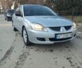 Сірий Міцубісі Lancer, об'ємом двигуна 1.58 л та пробігом 325 тис. км за 4200 $, фото 1 на Automoto.ua