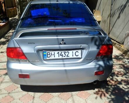 Серый Мицубиси Лансер, объемом двигателя 1.6 л и пробегом 308 тыс. км за 3500 $, фото 7 на Automoto.ua