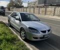 Серый Мицубиси Лансер, объемом двигателя 1.6 л и пробегом 300 тыс. км за 3500 $, фото 1 на Automoto.ua