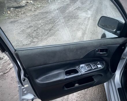 Серый Мицубиси Лансер, объемом двигателя 1.6 л и пробегом 315 тыс. км за 2950 $, фото 5 на Automoto.ua