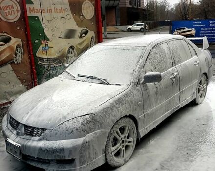 Сірий Міцубісі Lancer, об'ємом двигуна 2 л та пробігом 1 тис. км за 5200 $, фото 8 на Automoto.ua