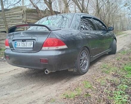 Сірий Міцубісі Lancer, об'ємом двигуна 1.58 л та пробігом 360 тис. км за 4000 $, фото 7 на Automoto.ua