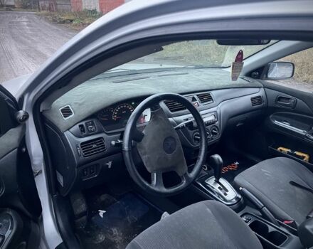 Серый Мицубиси Лансер, объемом двигателя 1.6 л и пробегом 315 тыс. км за 2950 $, фото 4 на Automoto.ua