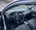 Серый Мицубиси Лансер, объемом двигателя 1.6 л и пробегом 315 тыс. км за 2950 $, фото 4 на Automoto.ua