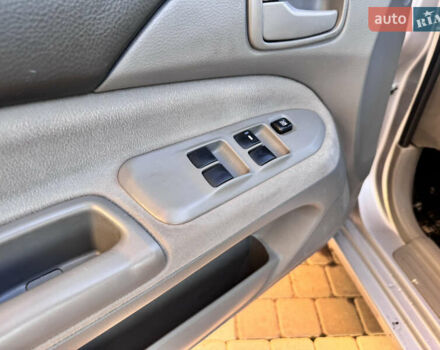 Сірий Міцубісі Lancer, об'ємом двигуна 1.3 л та пробігом 450 тис. км за 2750 $, фото 9 на Automoto.ua