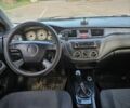 Сірий Міцубісі Lancer, об'ємом двигуна 1.6 л та пробігом 270 тис. км за 3200 $, фото 21 на Automoto.ua