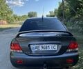 Сірий Міцубісі Lancer, об'ємом двигуна 1.6 л та пробігом 320 тис. км за 3602 $, фото 1 на Automoto.ua