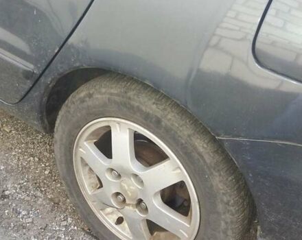 Сірий Міцубісі Lancer, об'ємом двигуна 1.58 л та пробігом 531 тис. км за 2828 $, фото 8 на Automoto.ua