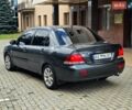 Сірий Міцубісі Lancer, об'ємом двигуна 1.58 л та пробігом 230 тис. км за 2999 $, фото 5 на Automoto.ua