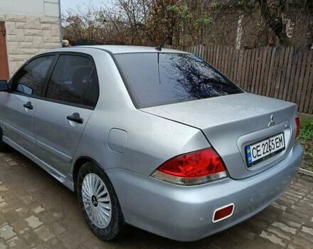 Сірий Міцубісі Lancer, об'ємом двигуна 1.58 л та пробігом 439 тис. км за 2500 $, фото 4 на Automoto.ua